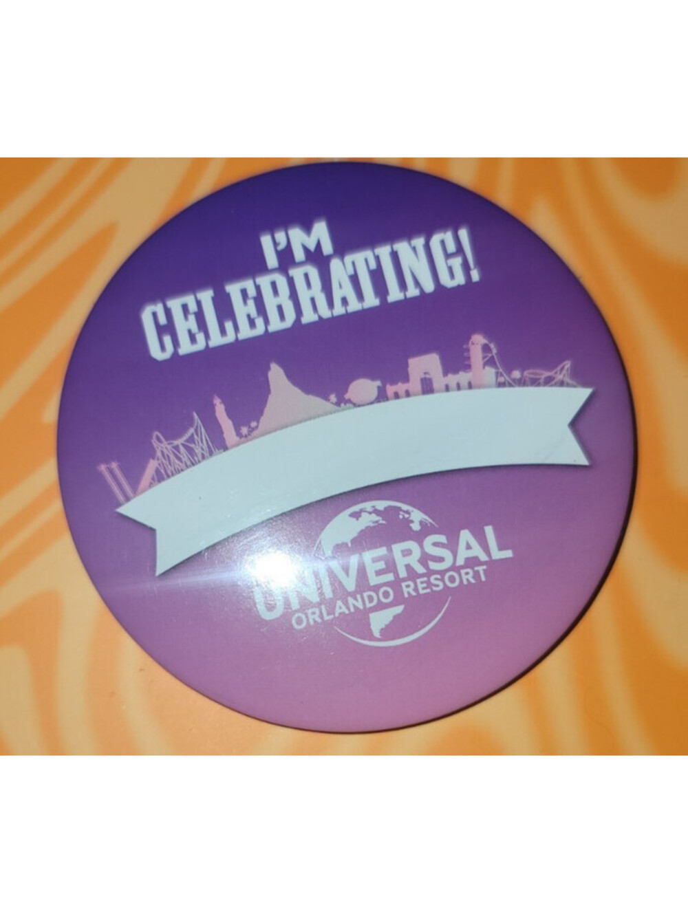 UNIVERSAL STUDIOS "IM CELEBRATING'" PURPLE BUTTON PIN - NEW